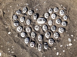 Stones heart on sand