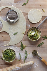 homemade vegetarian tartellettes with leeks and rocket