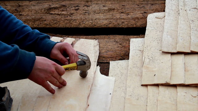 Arranging cedar wooden shingle shake wood planks
