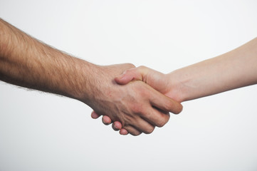 Man and woman shaking hands. Isolated on white background.