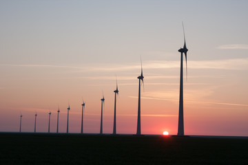 Silhouette of a Windfarm during sunset