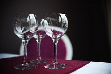 Empty wine glasses on table at a restaurant