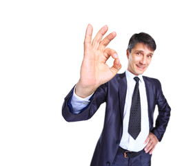 cheerful young business man with okay gesture