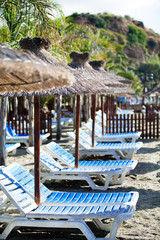 Sun beds on the sea beach