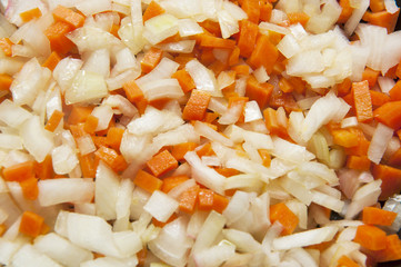 Closeup of chopped vegetables - carrot, onion, garlic