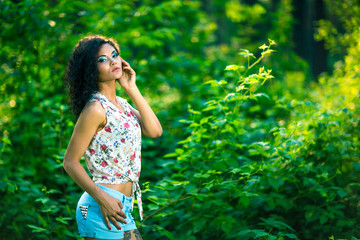 portrait of a beautiful blonde outdoors in the park