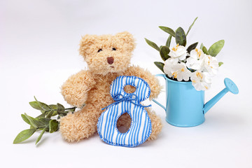 Composition on March 8 - teddy bear with flowers