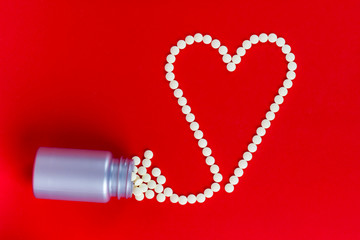 Heart shape made with pills
