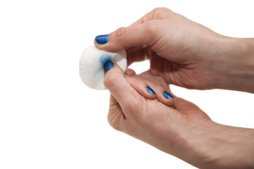 manicure process: removing nail polish with nail-polish remover
