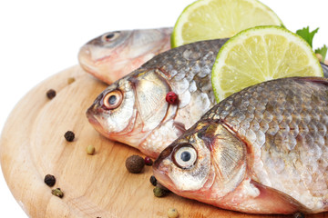 Fresh fishes with lime, parsley and spice