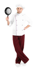 Professional chef in white uniform and hat, holding pan in his