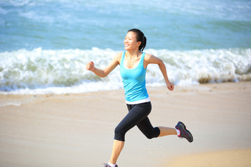 woman running at beach