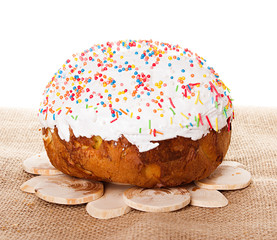 Easter cake with glace icing on white background