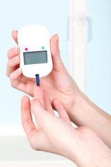 Measuring glucose level blood close-up