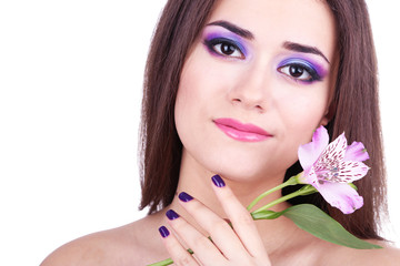 Fototapeta premium Beautiful young woman with flower isolated on white