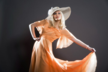 Soft focus retro hippie 70s fashion sensual girl with long blond