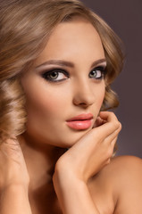 Portrait of beautiful young woman with makeup