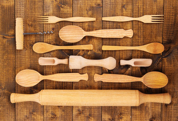 Wooden kitchen utensils on table close-up