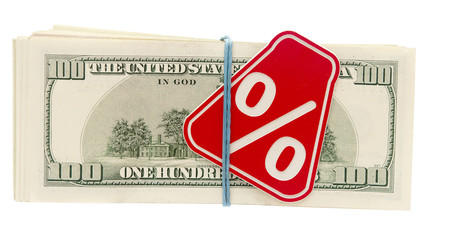 Sign % on the background of one hundred dollar bills