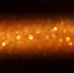 defocused golden lights background. abstract lights background. 