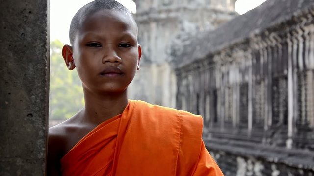 cambodian monk in angkor wat temple
