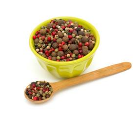 Peppercorn mix in a wooden spoon