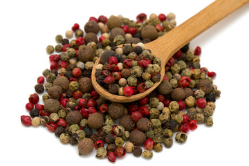 Peppercorn mix in a wooden spoon