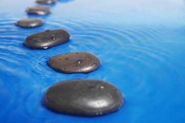 zen stones in water