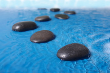 Fototapeta na wymiar zen stones in water