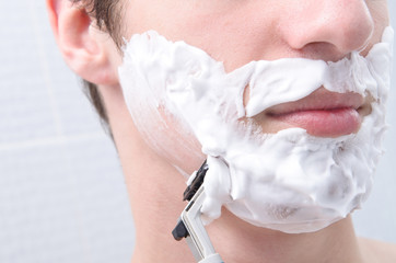 man shaves