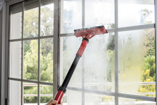 cleaning window with steam