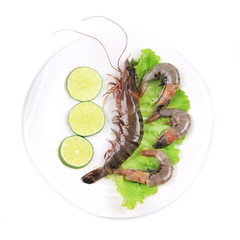Raw tiger shrimps on plate.
