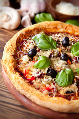 Fresh italian pizza on wood