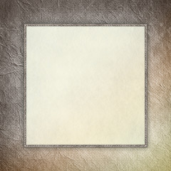 Blank sheet in picture frame on crumpled paper background