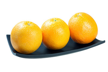 Three Orange on wooden tray on the white background