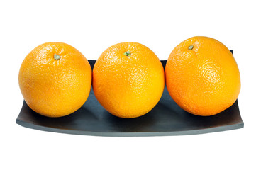 Three Orange on wooden tray on the white background