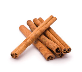Heap of Cinnamon isolated on white