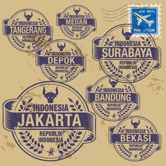 Grunge rubber stamp set with names of Indonesia cities