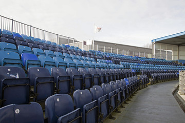 Fototapeta premium Blue chairs in a baseball stadium