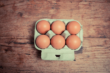 Six eggs in a cardboard tray
