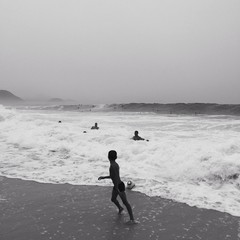 a boy plays with ball on copacabana beach Rio de Janeiro, Brazil - 62226025