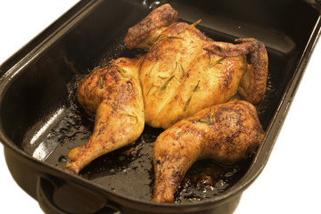 Plattes Huhn im Bräter
