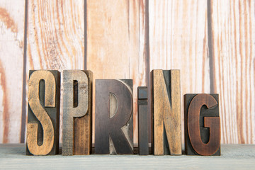 Spring in print letters