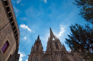 Fototapeta na wymiar Barcelona Cathedral Santa Eulalia fachade details and sky