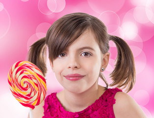 Little cute girl with lollipop