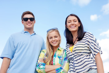 group of friends having fun on the beach