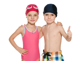Two smiling children in swimsuits