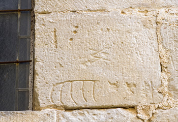 stonemason marks etched in stone