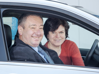 Woman and man in car