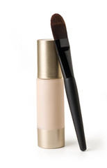 make up powder and a brush